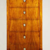 An elegant Biedermeier six-drawer tall chest of drawers