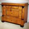 A fine Biedermeier petite three drawer commode