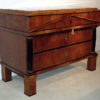 A monumental Biedermeier three drawer commode