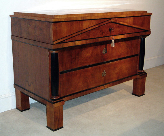 A monumental Biedermeier three drawer commode