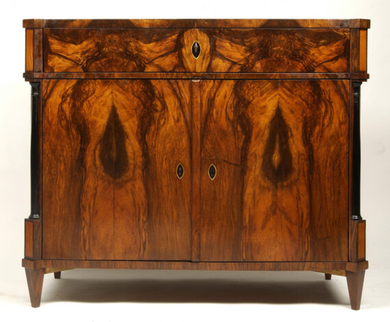 A Biedermeier two door commode / sideboard