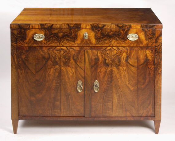 A Biedermeier trumeau commode
