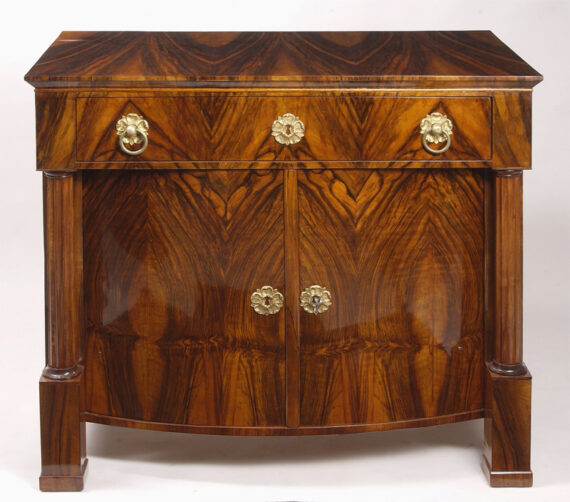 An outstanding Biedermeier trumeau commode