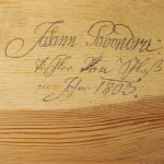 An elegant Neoclassical two drawer commode