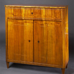 A Biedermeier trumeau commode