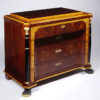 A fine Empire Revival four-drawer commode