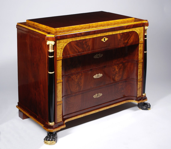 A fine Empire Revival four-drawer commode