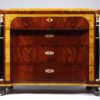 A fine Empire Revival four-drawer commode