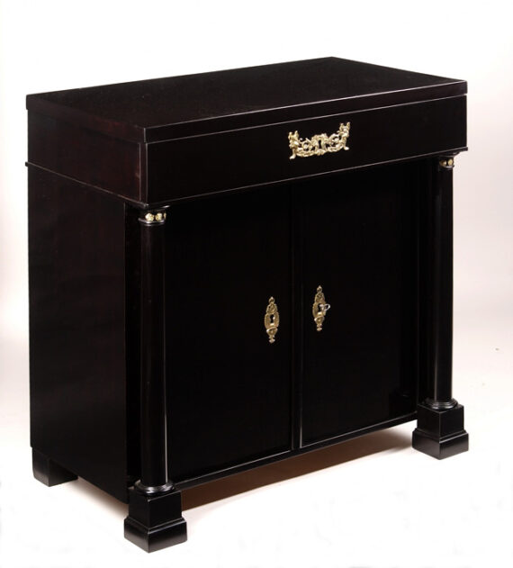 A fine Empire trumeau commode