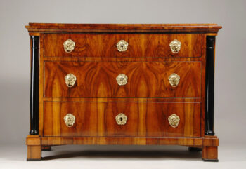 A stately Biedermeier three drawer commode