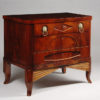 A petite Biedermeier three drawer commode