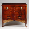 A petite Biedermeier three drawer commode