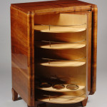 An Art Deco convertible bar/bookcase