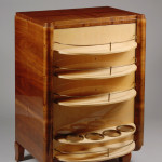An Art Deco convertible bar/bookcase