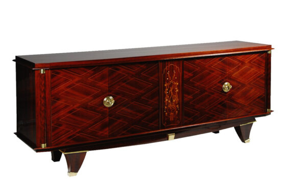 An Art Deco sideboard in the style of Jules Leleu