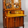 An exceptional Biedermeier trumeau  commode with drop-front desk and   vitrine