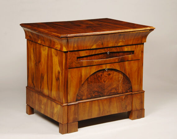 A handsome Biedermeier four drawer commode
