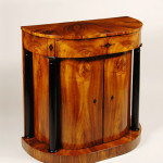 An exceptional Biedermeier demi-lune commode