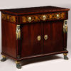 A Viennese Empire Trumeau commode.