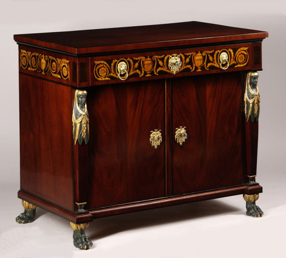 A Viennese Empire Trumeau commode.