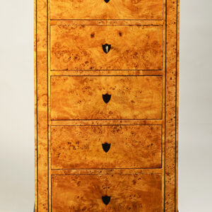 A tall Biedermeier five-drawer chest