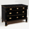 A three-drawer, ebonized Biedermeier commode