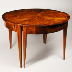 A pair of Biedermeier demi-lune console tables