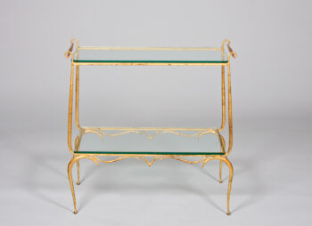 A forged iron and gilt French Forties console
