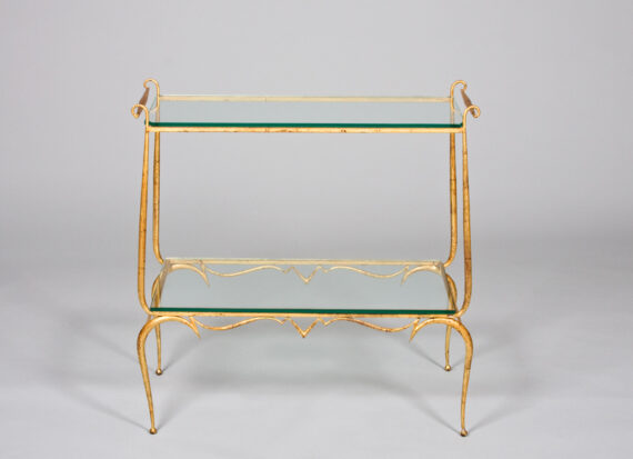 A forged iron and gilt French Forties console
