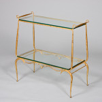 A forged iron and gilt French Forties console