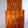 A fine Biedermeier corner cabinet with fold-down writing surface