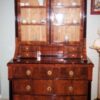 A Biedermeier commode with display cabinet