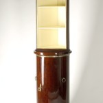An unusual  Empire display corner cabinet