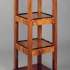 A small Biedermeier etagere with three hidden drawers