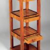 A small Biedermeier etagere with three hidden drawers