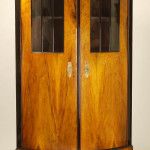 A Biedermeier corner bookcase