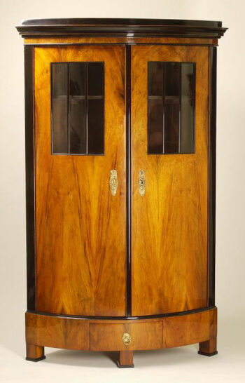 A Biedermeier corner bookcase