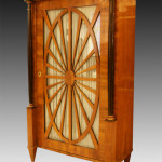 An outstanding pair of Biedermeier single door vitrines