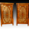 An outstanding pair of Biedermeier single door vitrines