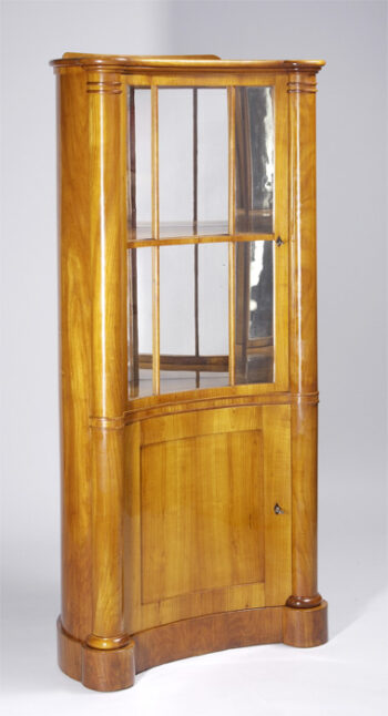 An unusual Biedermeier corner display cabinet