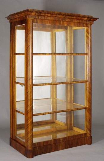 A Biedermeier side opening vitrine