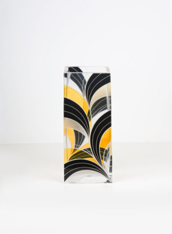 A mid-century cut and molded glass vase