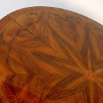 A rare and exceptional Neoclassical extendable dining table