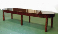 A Biedermeier extendable dining table with diagonally banned legs and cross banded details 3