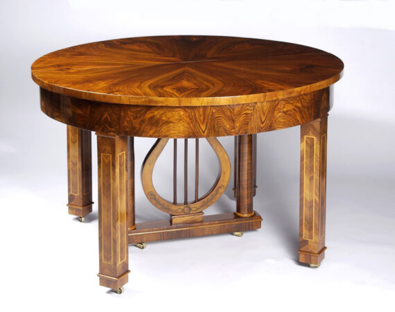 A rare Biedermeier extendable dining table