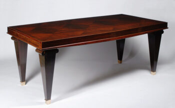 An Art Deco extendable dining table