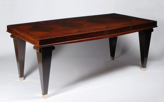 An Art Deco extendable dining table