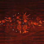 An extendable dining table in the manner of Jules Leleu