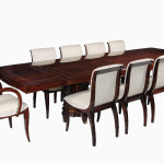 An extendable dining table in the manner of Jules Leleu