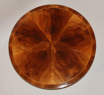 An exceptional Neoclassical extendable dining table